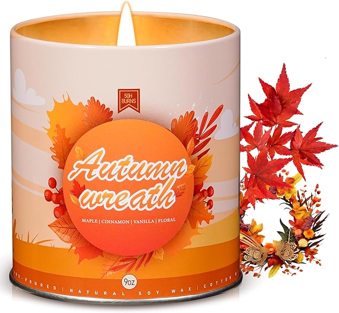 White 9 oz soy wax scented candle jar with orange autumn wreath label and cotton wick