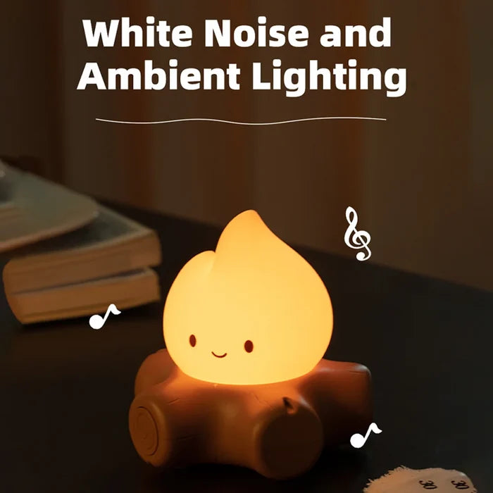 Glowing teardrop night light with smiling face on brown base
