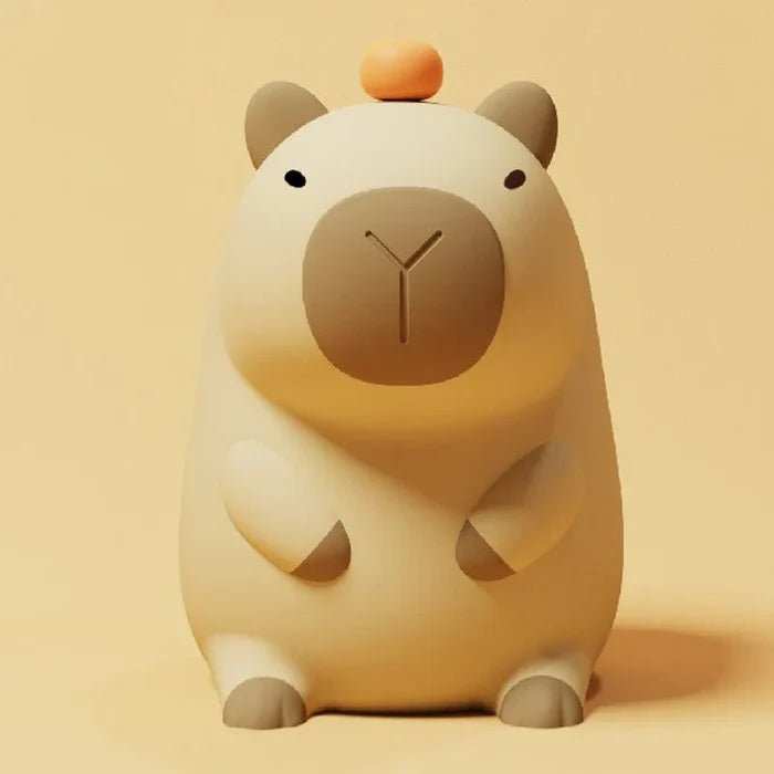 Capybara night light with brown snout circle and curved legs, orange-capped top