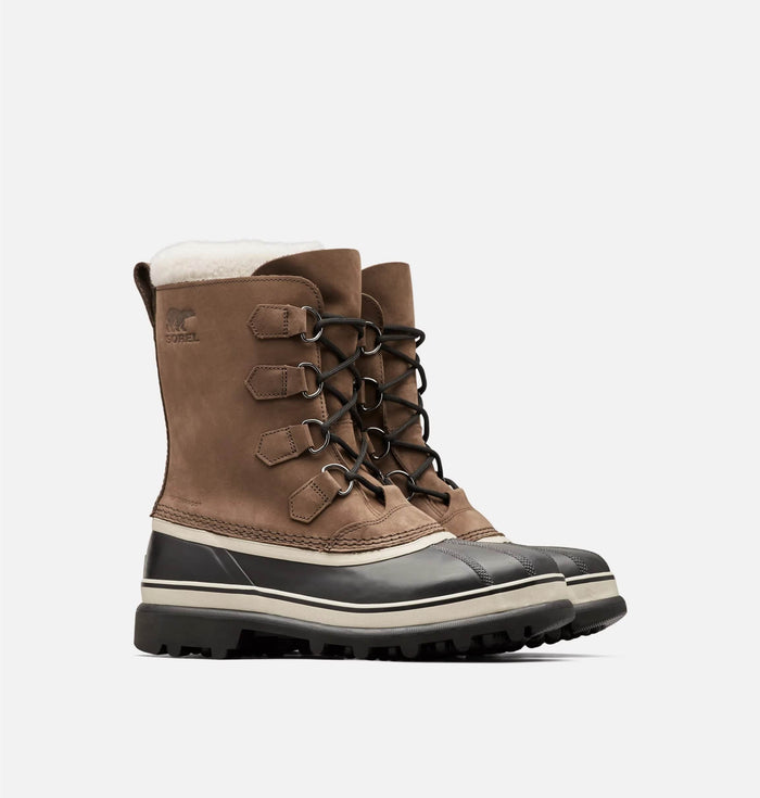 Sorel Caribou Winter Boots in brown leather with black rubber shell, shearling lining, and lace-up design, side angle view.