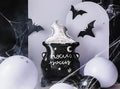 Halloween cauldron foil balloon with bats and sparkly black magic design