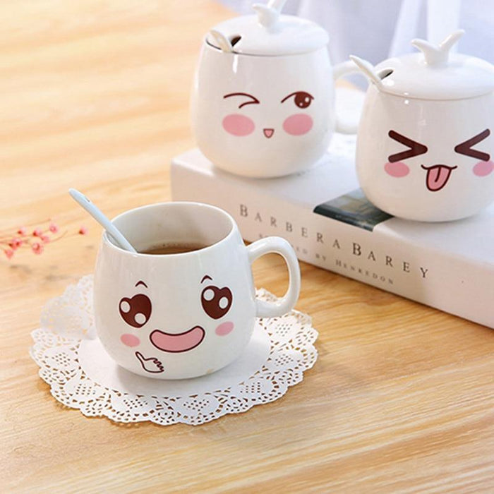Ceramic mug with lid, white finish, smiling face with rosy cheeks and whisker lines
