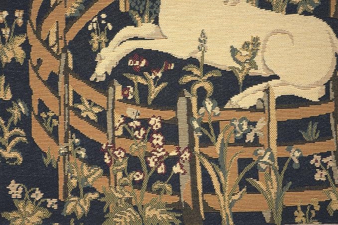 Close-up navy jacquard pillow cover with unicorn resting, plants, and ornate lattice