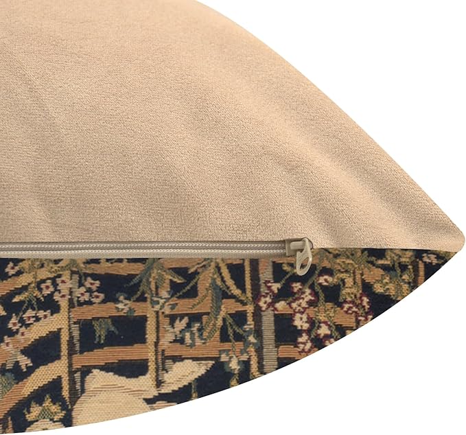Navy tapestry pillow cover with tan zipper opening and beige backing
