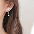 Cherry blossom drop earrings with pink crystal flowers and dangling heart charm