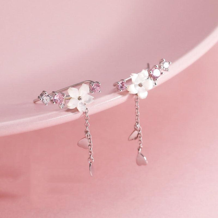Cherry blossom drop earrings with pink and white floral clusters, silver chain and heart dangles