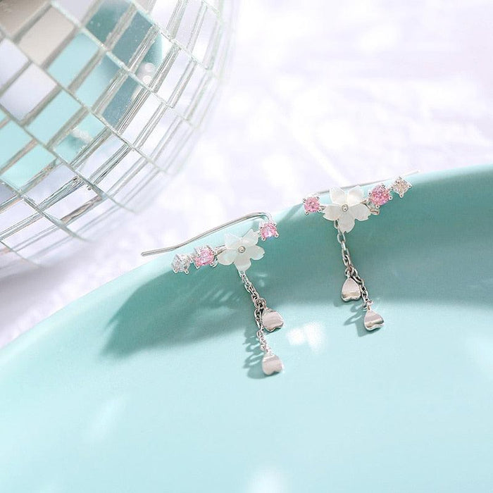 Cherry blossom drop charm earrings, silver-tone with pink blossoms and long dangling heart charms