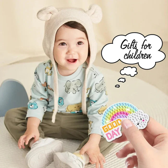 Unicorn diamond painting keychain kit shown with a child wearing a hood and holding a charm.