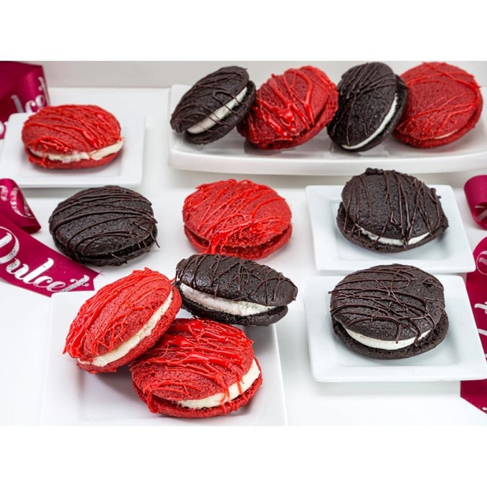 Assorted whoopie pies, red velvet and chocolate, arranged on white trays