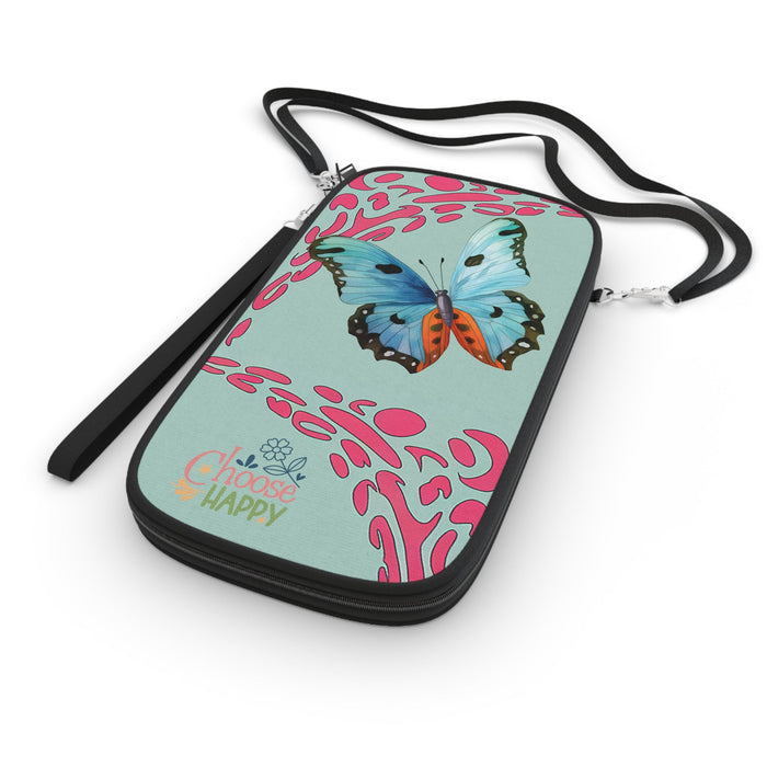 Mint passport wallet with butterfly print and pink pattern, black strap and zipper