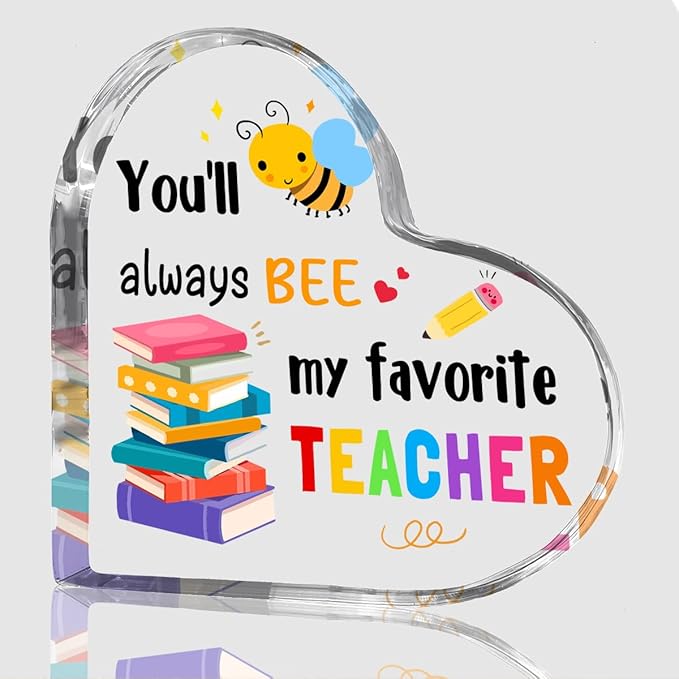 Acrylic heart teacher gift with bee graphic and message 'my favorite teacher'.