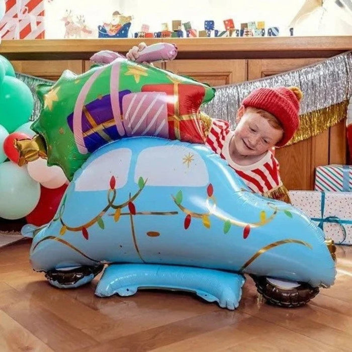 Light blue car-shaped balloon with striped gift box and gold ribbon