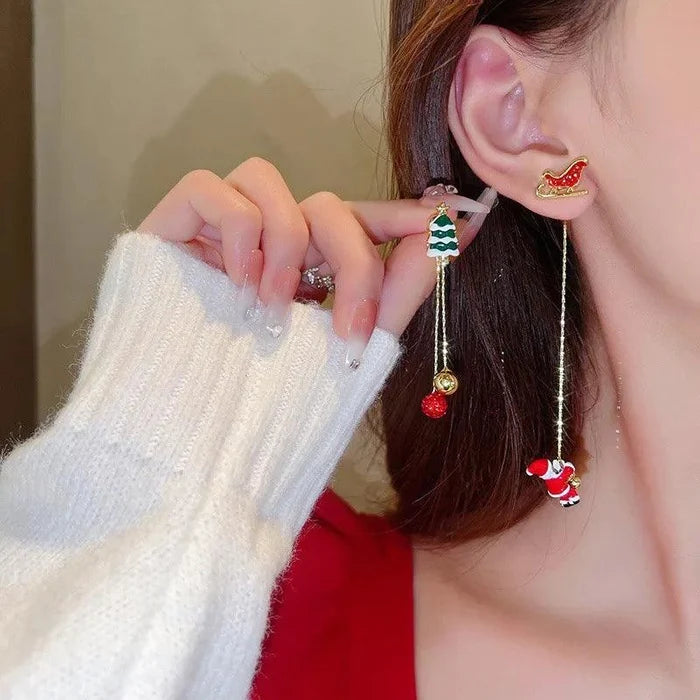 Christmas drop earrings with green tree charm, red bell charm, and long chain dangles.
