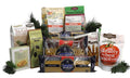 Italian gift basket with assorted packaged pasta, snacks, and green tinsel garnish