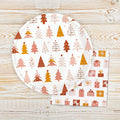 Christmas tree icon paper napkins, white with red, orange, and green tree patterns
