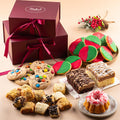 Christmas sampler gift tower with open box of assorted cookies, brownies, and pastries