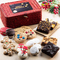 Christmas cookie sampler in red woven gift basket with snowman, gingerbread, and brownies