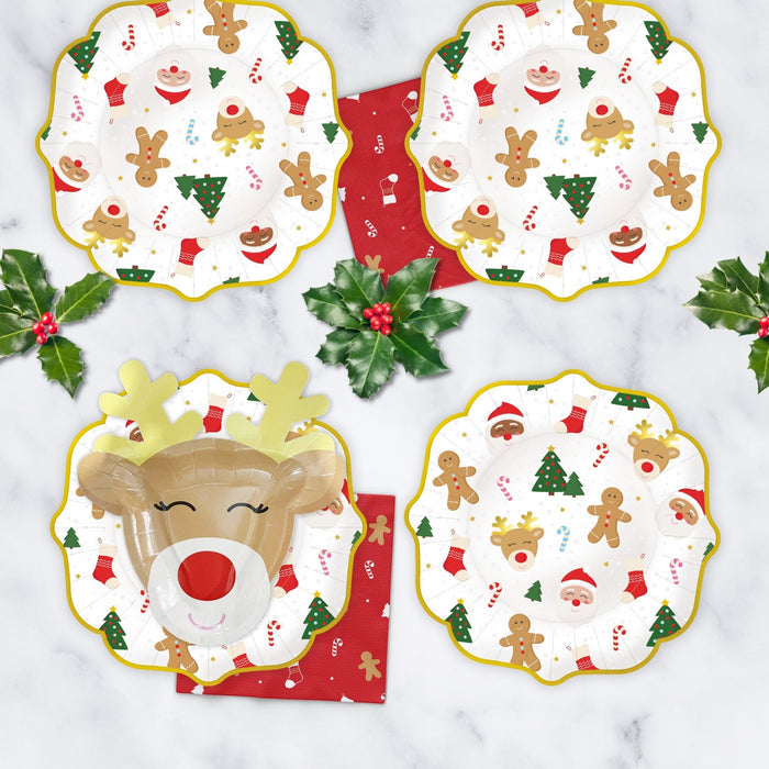 Set of four Christmas icon plates with gold scalloped edges, featuring Santa, gingerbread, and reindeer