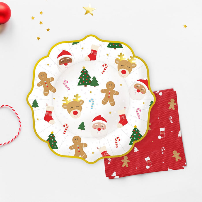 Christmas icon plate with gold scalloped rim, featuring Santa, gingerbread, and evergreen trees