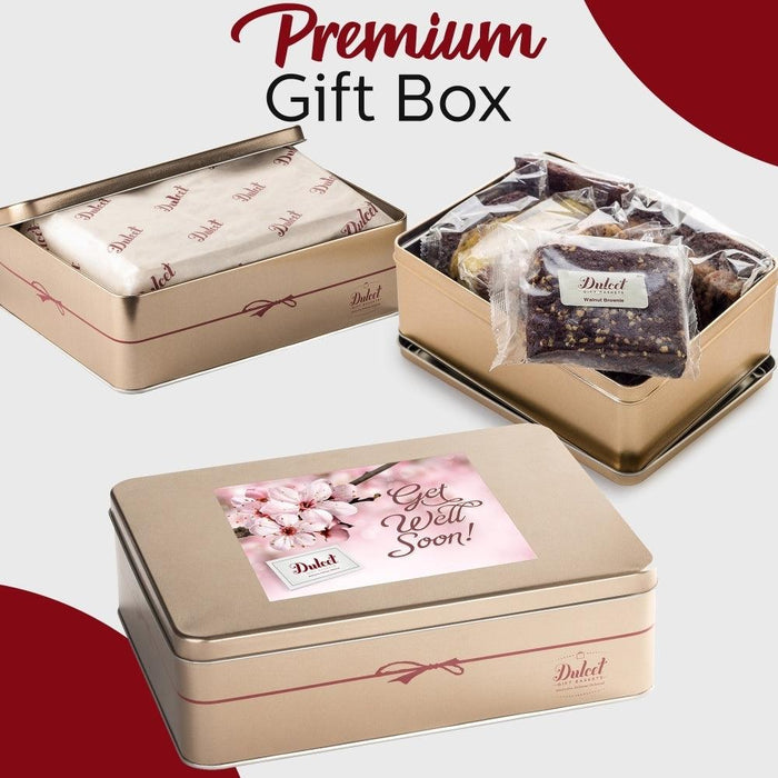 Premium gift box tin with “Premium Gift Box” graphic, showing assorted wrapped cookies