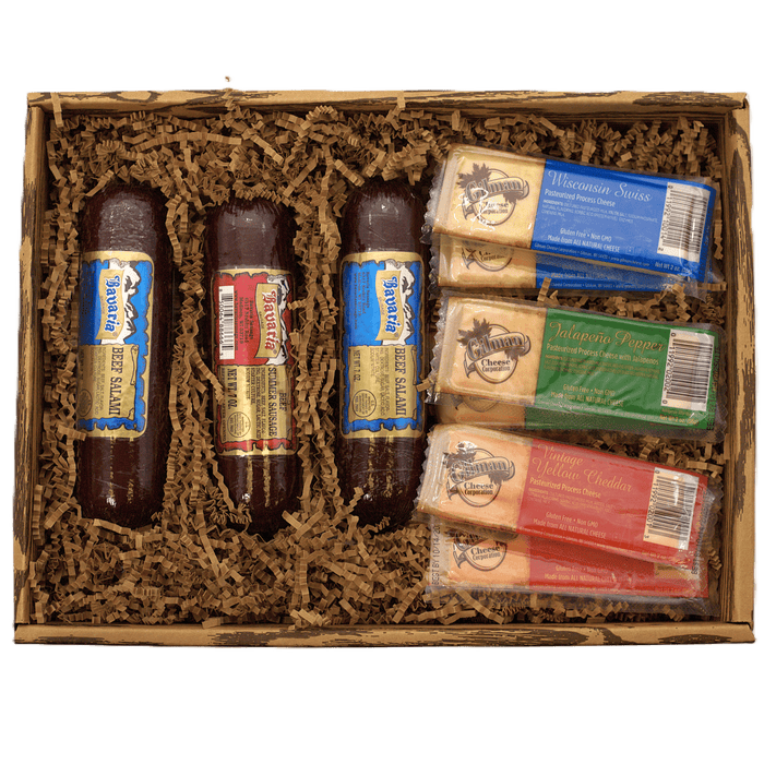 Meat and cheese gift box open with salami, cheese bars, and wrapped cheese