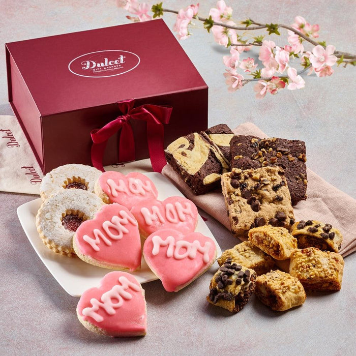 Mother heart cookies, mixed brownies, and gift box with ribbon in a care package