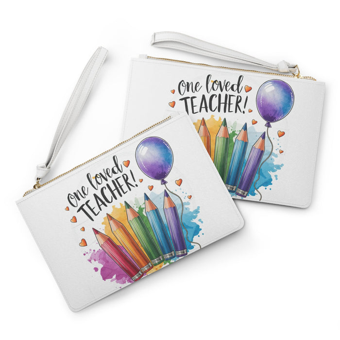 Two white zip-top clutch bags with 'One loved teacher!' pencils and balloon prints