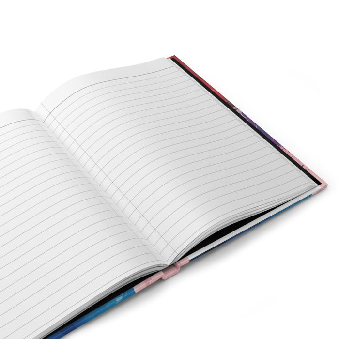 Open hardcover journal with white lined pages and dark cover edge