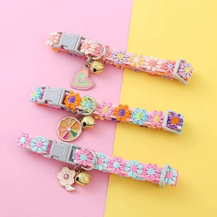 Adjustable braided pet collars, pastel floral designs with heart and animal bell charms.