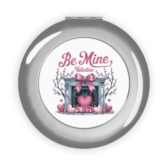 Silver glossy compact travel mirror with “Be Mine Valentine” heart graphic on the cover