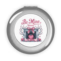 Silver glossy compact travel mirror with “Be Mine Valentine” heart graphic on the cover