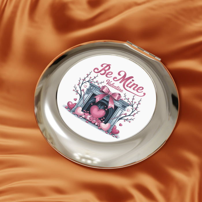 Silver glossy compact travel mirror cover with “Be Mine Valentine” heart artwork