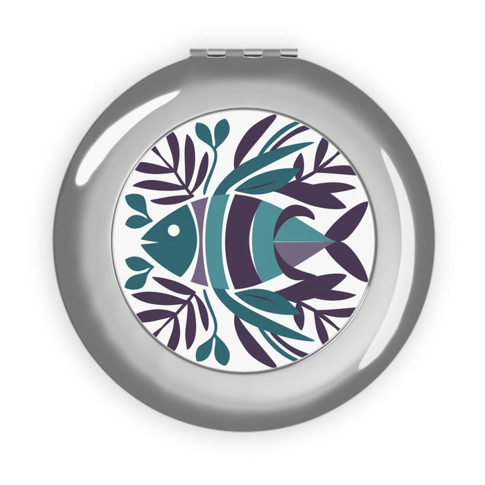 Compact travel mirror with silver glossy case and fish life round graphic inset