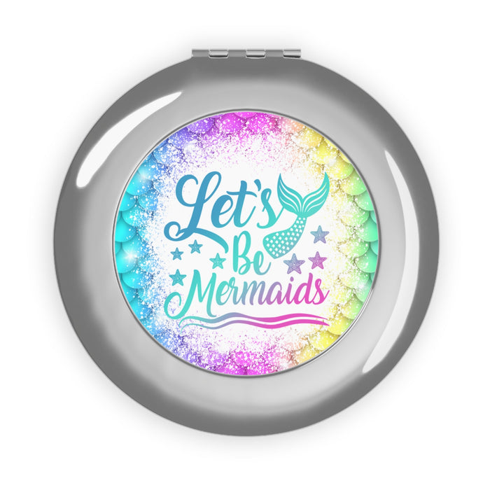 Silver glossy compact travel mirror with colorful mermaid quote graphic on circular face