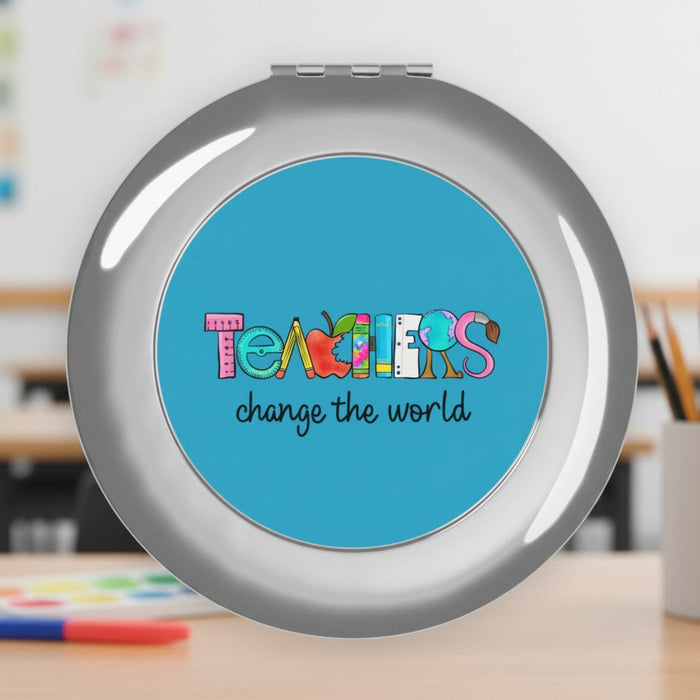 Silver glossy compact travel mirror with blue Teachers graphic on the round mirror cover