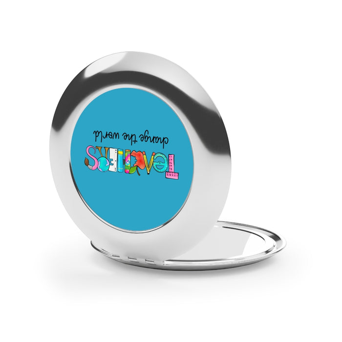 Silver glossy compact travel mirror with Teachers graphic on the round face, open