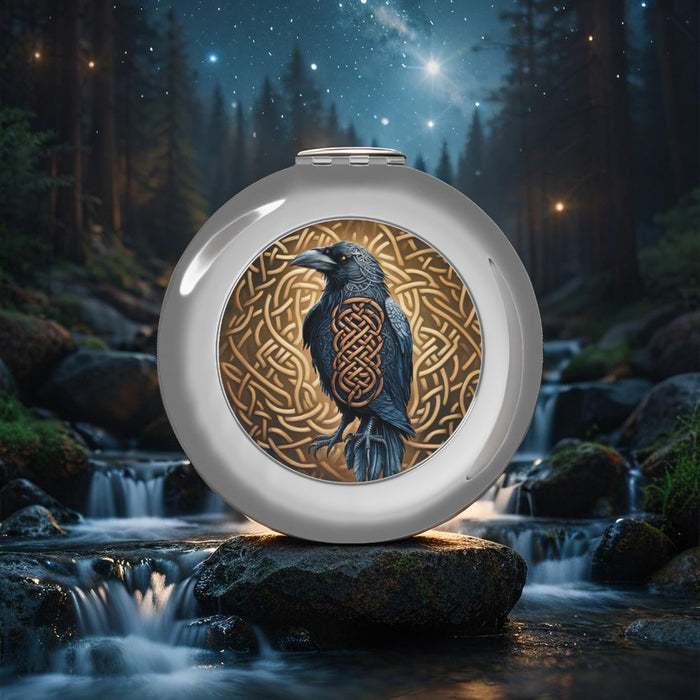 Silver glossy compact travel mirror with round bird and Celtic knot artwork
