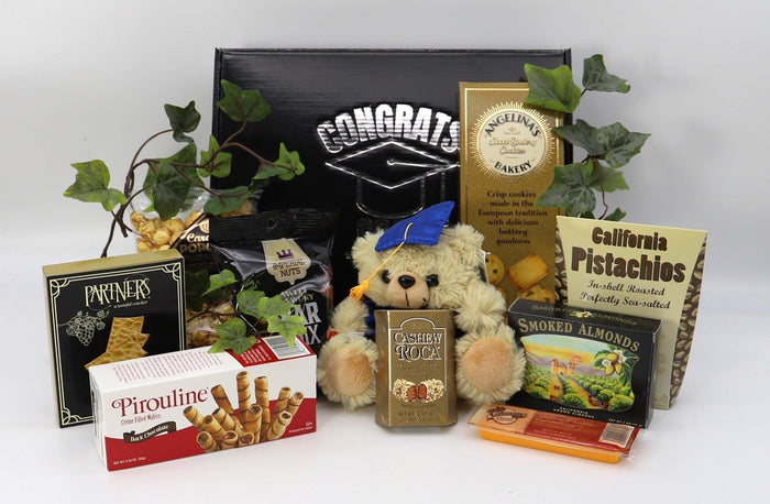 Black "Congrats Grad" gift box with plush bear, nuts, and snack packages.