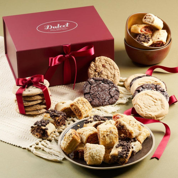 Assorted cookie gift basket with ribbon-wrapped box and mixed cookies on a plate