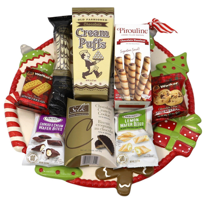 Christmas cookie gift platter with red-and-green border and assorted packaged cookie snacks
