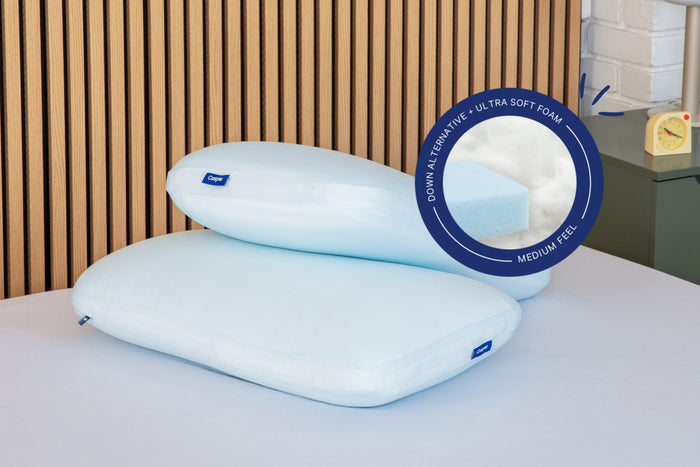 Two Hybrid Snow Pillows with a close-up of the inside material of the pillow. Text on the image reads "Down Alternative. Ultra soft foam. Medium feel."
