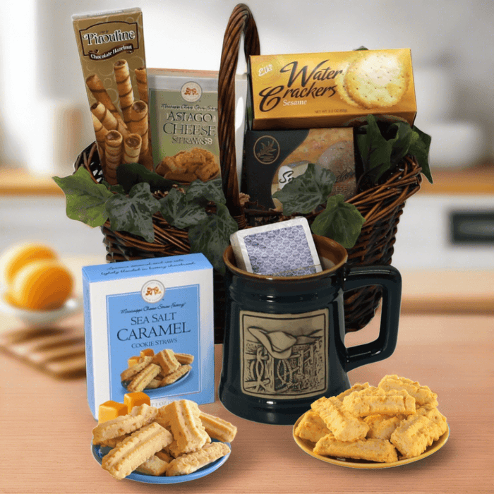 Gift basket with woven handle, dark mug, crackers, cookie box, and snack packages