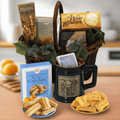 Gift basket with woven handle, dark mug, crackers, cookie box, and snack packages
