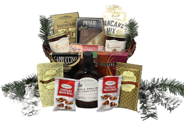 Wicker breakfast gift basket with cappuccino, pancake mix, jam, and chocolate wafer bites
