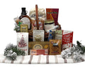 Wicker gift basket filled with holiday breakfast foods and candy, on striped fabric runner
