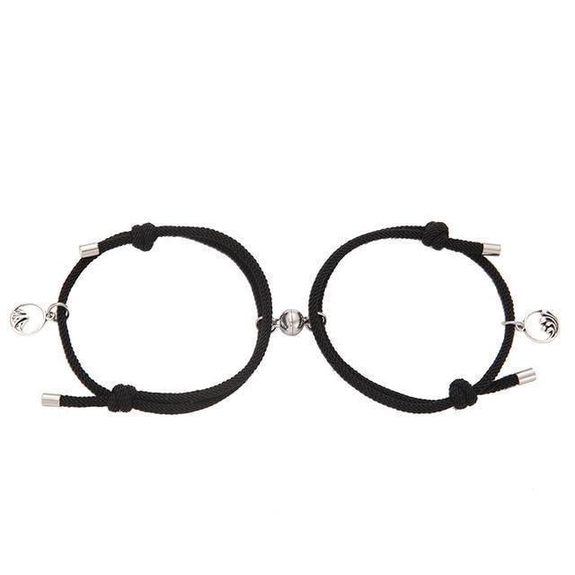 Black braided couple attraction bracelets with round charm beads and metal tube ends