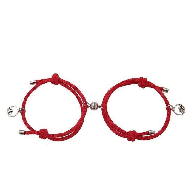 Red braided couple attraction bracelets with round charm beads and metal tube ends