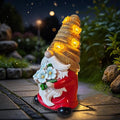 Bee-themed solar LED garden gnome statue with red outfit, white beard, blue flowers, glowing hat