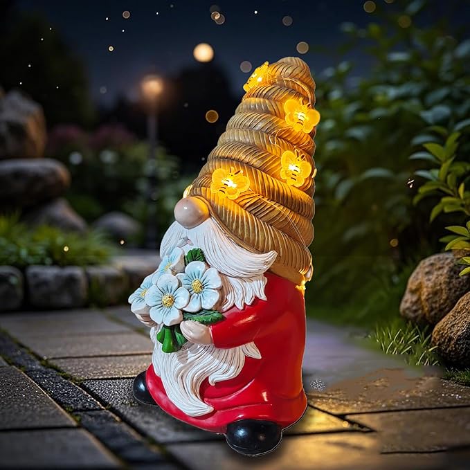 Bee-themed solar LED garden gnome statue with red outfit, white beard, blue flowers, glowing hat