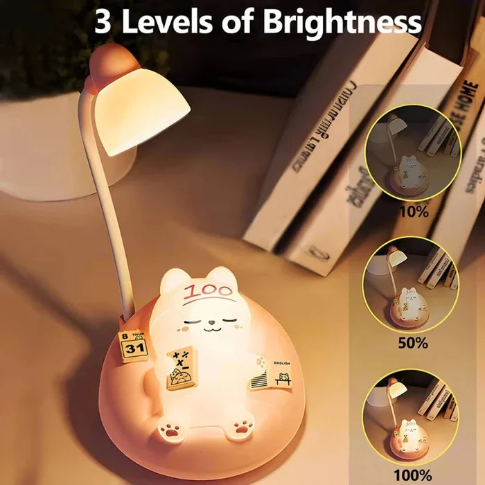 Glowing cat night light with warm white light, seated cat on round pink base